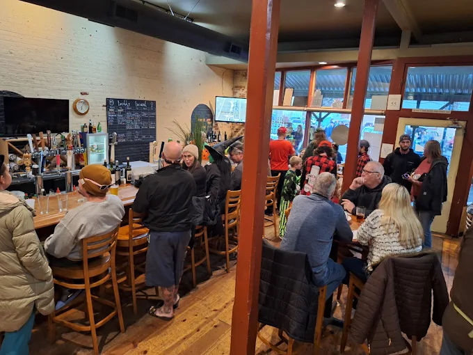 Guests gathered inside the current Main Street Pizza dining room and bar