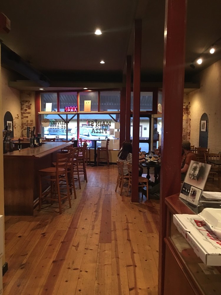 Tables and seating in the current Main Street Pizza dining room