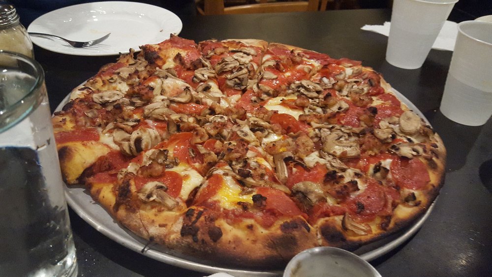 A freshly baked specialty pizza from Main Street Pizza